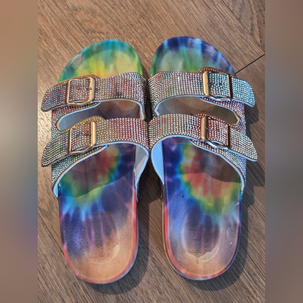 Nicole Miller double-buckle slide sandals, featuring a tie-dye patterned footbed